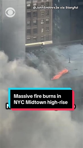 The New York City Fire Department battled a large fire on the roof of a Midtown Manhattan high-rise that sent black smoke into the air near the St. Patrick's Day Parade on Tuesday. The building, currently being renovated from offices into residential units, caught fire in a cooling tower on the roof—part of its HVAC system—prompting an all-hands response. #fire #nyc #newyork