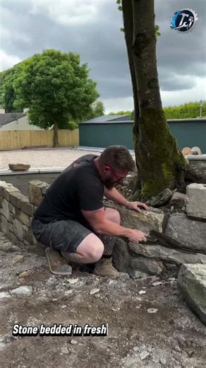Building a Natural Stone Wall by Hand 🪨🧱 #stonewall #masonry #stonework