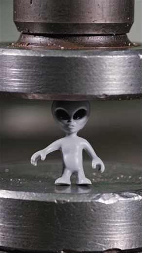 Crushing Concept Toy Alien Crushed by Hydraulic Press