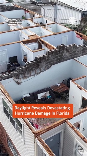 Devastating damage in Milton, Florida, after Hurricane Isaias tore through the area. Powerful winds ripped the roofs off an apartment complex and a high school gymnasium and knocked down trees throughout the area.
