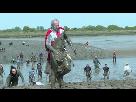 Runners battle mud at annual UK charity race