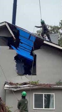 Crews work to remove tree from Decatur home