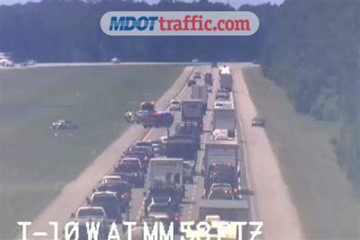 Update: Crashed car moved out of median, I-10 traffic returns to full speed