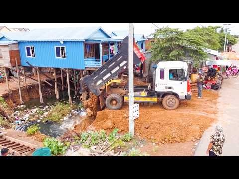 Heavy Machinery at Work! Bulldozer Pushing Massive Amounts of Soil & Debris Clearing into water