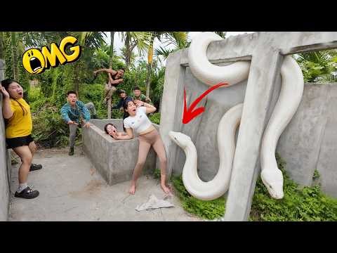 Brave experts risked their lives to save ethnic girl attacked by nest of giant white pythons