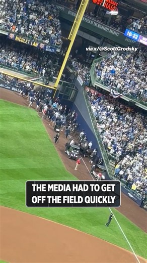 The media had to get off the field quickly