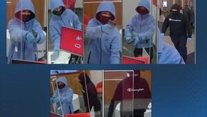 Boston police release photos of suspects wanted in connection with bank robbery as search continues