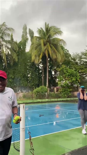Tennis Player Startled by Lightning Strike Near Court