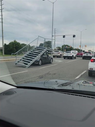 Vehicle Drives with Metal Staircase Impaled on It
