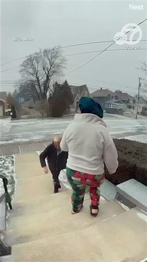 Strong wind gusts send woman flying down stairs