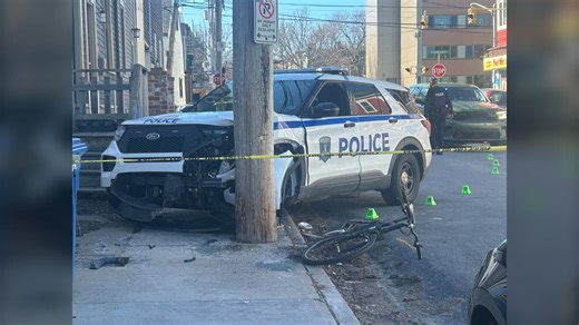 Halifax police car hits suspect, crashes into telephone pole