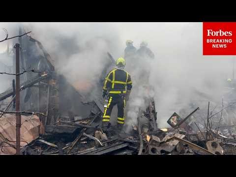 Building Left Smoldering After Russian Drone Strikes In Kyiv Injure At Least Three