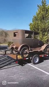 All original 1925 Model T barn find driving into the museum. | Miles Through Time Automotive Museum