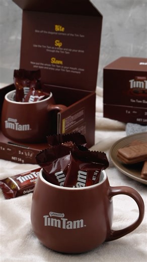 Gift something indulgent this festive season with our Tim Tam hug mug gift set 🎁 Bite, sip and slam with the cutest Tim Tam hug mug. It comes with everything you need for the ultimate Tim Tam slam 😍 #timtam #christmas #gifting #christmasgifting #hugmug #timtammug #mug #perfectmug #seasonal #festive #festiveseason #christmasgift #gift #giftideas #choc | Arnott's Tim Tam