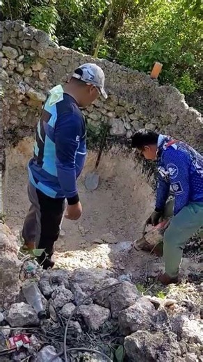 using jack hammer to break the solid rock.