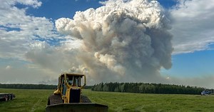 Raging wildfires in Alberta force evacuations in remote communities