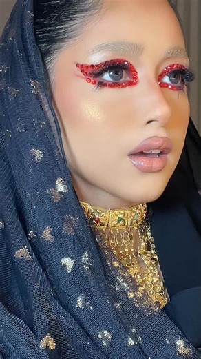 Elegant Sheer Overlay Outfit with Shiny Embellishments