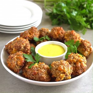 1.1K reactions · 3.5K shares | My boys devour these Cheddar Sausage Balls every time I make them for our holiday munchies Full recipe here: https://www.melissassouthernstylekitchen.com/cheddar-sausage-balls/ | Melissa's Southern Style Kitchen | Facebook