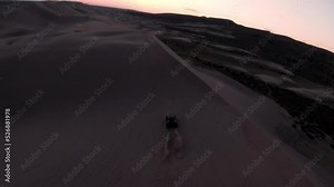 UTV vehicles off-roading in the sand dunes