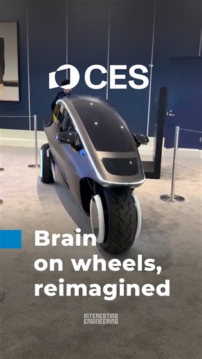 Interesting Engineering on Instagram: "TRINITY is a next generation three wheel electric micromobility vehicle combining driver centric design with advanced artificial intelligence. Powered by NVIDIA DGX Spark, it uses conversational agents and goal tracking workflows to manage navigation, comfort, and connectivity. The vehicle features a weatherproof cabin, luxury interior, studio grade audio, 120 mph capability, and an integrated AI brain for smart urban mobility. #CES2026"