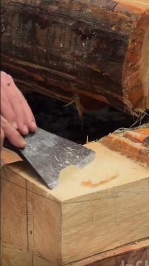 The process of scraping a wooden board using a special sharp tool