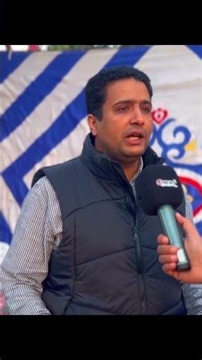 Dr. Mustafa Herzallah reveals details of the charity table set up by the Charity Bank in front of...