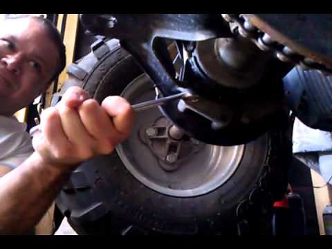 How to adjust tighten drive chain trail boss 330