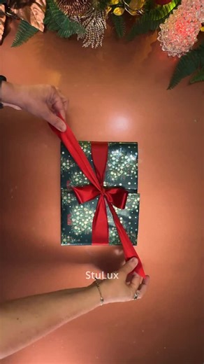 68K views · 1.4K reactions | ❄️SURPRISE Gift Wrap - OPENS Without Ripping ✅  COMMENT ‘SLOW’ if you need a STEP-BY-STEP tutorial with more details for this wrapping technique  Images Captured and Edited by @stulux_ . #christmas2025 #christmascountdown #christmas #giftwrapping #217stulux | StuLux Gift Wrapping | Facebook