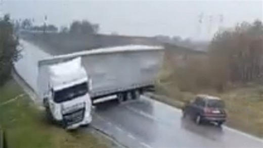 Horror moment semi-trailer loses control, jackknifes and flattens car