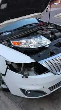 2009 Lincoln MKS headlight bulb replacement