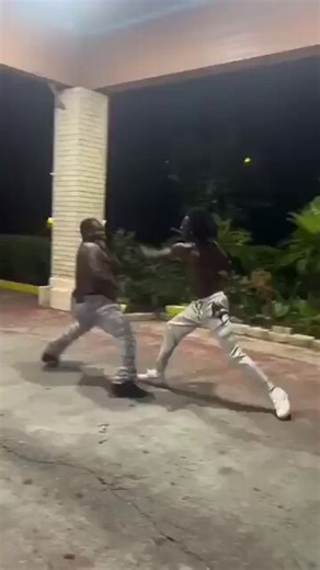 Fat black man and skinny black man fight