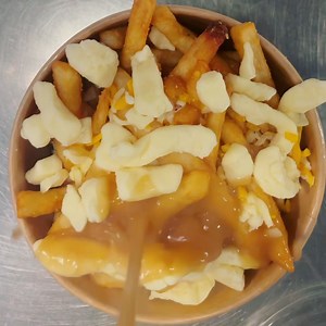 12 reactions · 5 comments | We use a blend of cheese curds and shredded cheese to make our poutine creamy, we then top it off with turkey gravy and green onion and it is oh soo good! P.S.A every wednesday you can get any large poutine for $2 off! #youregonnaneedanapkin! | Extreme Eatery | Facebook