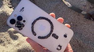iPhone user discovers MagSafe and ferrous sand do not mix | AppleInsider