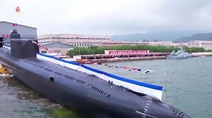 North Korea unveils first tactical, nuclear-armed submarine