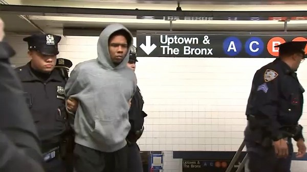 Witness recounts man escaping death after being pushed onto subway tracks; suspect charged