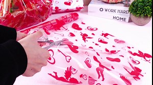 Gueevin Valentines Cellophane Wrap Roll Valentine's Day Cellophane Wrap Hearts Keys Cupid Gift Bags 100 ft Long x 16 in Wide 2.5 Mil Clear Gift Paper Roll for Crafts Treats Flowers Party Favors