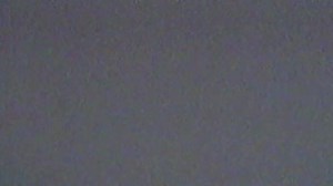 VHS shaking, flickering, defects, noise and artifacts on gray TV screen. Gray background of the CRT screen. Effect interruption of TV signal. Retro 80s, 90s.