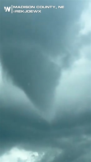 Check out this funnel cloud spotted in Madison County, NE, 2 miles north of Norfolk, NE, Saturday evening as thunderstorms pushed through the area. | WeatherNation