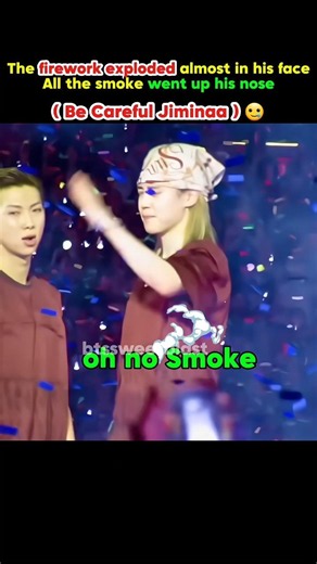 jimin struggling with smoke the confetti and smoke burst to him