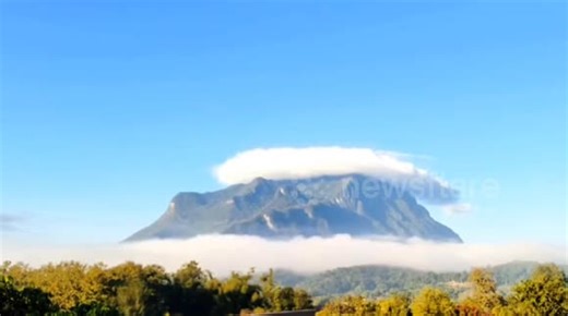 Stunning cap cloud forms over sky in northern Thailand