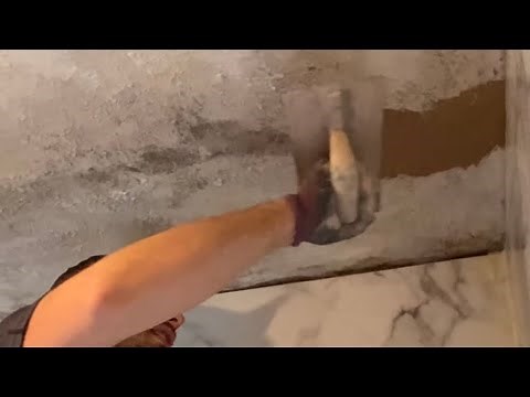 How to plaster over old artex ceiling which may contain asbestos