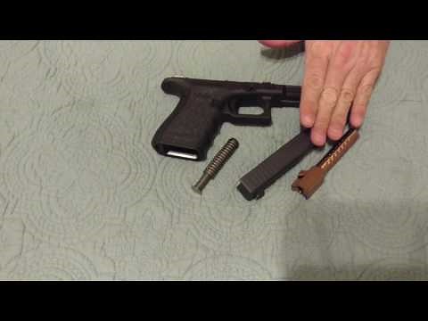 Glock slide removal...If you assemble w/o barrel and spring