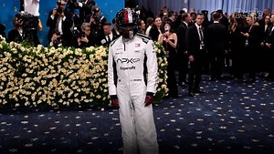 Damson Idris Strips Down for Major Red Carpet Reveal in F1-Inspired Suit and Crystal-Covered Helmet at 2025 Met Gala