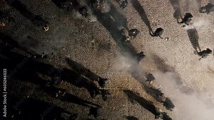 People Wearing Black Robes With Incense In The Street Of Antigua During Procession Of The Holy Week - aerial top down