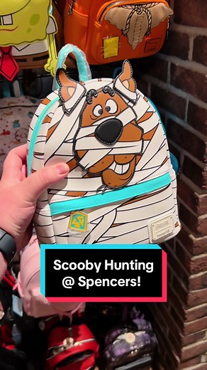 Let’s Go Scooby Hunting @Spencers !! 🧡💚🩵 For the new glow-in-the-dark Scooby-Doo mummy @Loungefly backpack!! #scoobydoo #collector #collection #nostalgia #mysteryinc #mysterymachine #halloween #loungefly #loungeflycollector #loungeflyminibackpacks #comeshopwithme #shop #haul