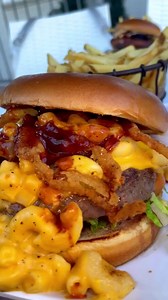 2.5K views · 38 reactions | Refuel your weekend with The Big Cheesy at Sugar Factory   This Monster Burger is topped with Mac and cheese, applewood smoked bacon and BBQ sauce 襤 #SouthBeach #MonsterBurger #Miami #SugarFactory | : @blake_201 | Sugar Factory | Facebook