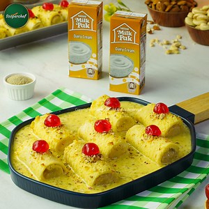 30K views · 2K reactions | Soft and creamy Bread Malai Roll is a perfect way to treat yourself this Ramzan. This khoya-filled treat topped with Rabri Milk makes up one supreme and unforgettable bite. Try out this Bread Malai Roll and share your feedback with us. #BreadMalaiRoll #Desserts #nestlémilkpakcream | SuperChef | Facebook
