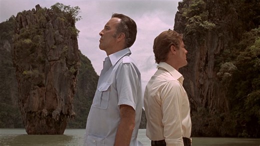 This month marks Roger Moore’s retirement announcement, the perfect time to revisit this iconic fight scene from THE MAN WITH THE GOLDEN GUN. The film saw Moore return for his second performance as 007, facing Christopher Lee’s Scaramanga. | James Bond 007