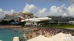 "Mind your heads !!!" on Maho Beach as this private jet comes in for a low pass earlier today. Happy Holidays! MahoBeachCam.com | Maho Beach Cam