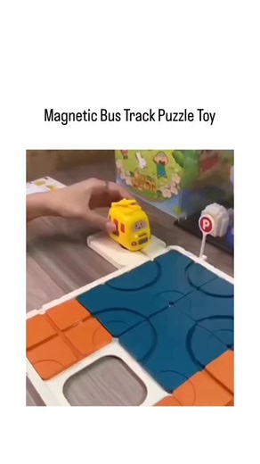 Popcorn Cafe🍿🎬 on Instagram: "This X post features a 13-second video of an adult assembling modular track tiles in real-time to guide a yellow toy bus along a path, captioned "so fun," highlighting the toy's engaging, hands-on play. (El), a verified user with 3,876 followers, the content has gone viral with 5.8 million views, 14,370 likes, and replies recommending similar Montessori-style puzzles on Amazon and AliExpress. The toy, a Chinese "拼拼乐" (assembly fun) bus puzzle set, supports early c